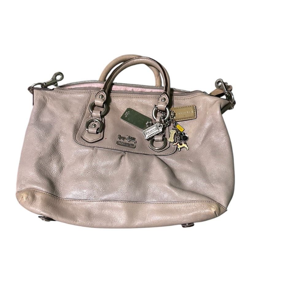 Coach vintage hand bag. Very used. Coach dog charms attached